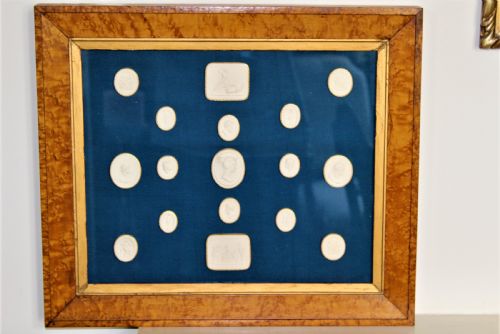 Set of 17 Framed Plaster Intaglios Coiled in Gold Paper