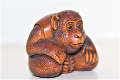Fine Quality and Signed Carved Boxwood Netsuke of a Crouching Monkey Meiji Period 1864 to 1912