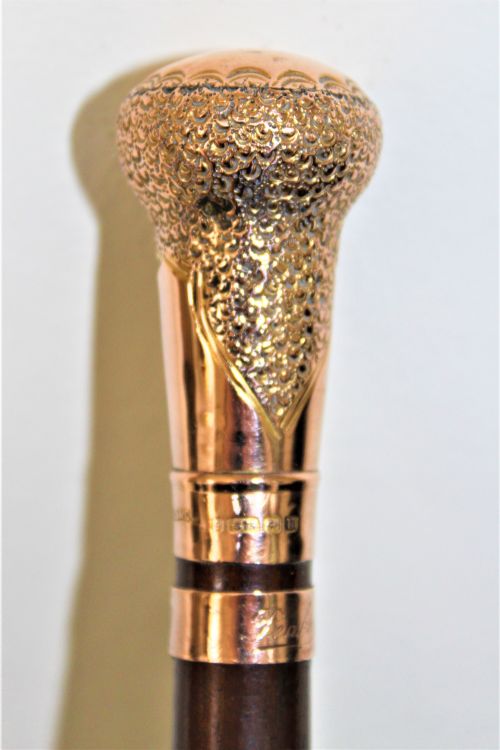 A Very Fine Gold Topped Lady,s Walking Stick. The Shaft Is Made of Mahogany Circa 1919