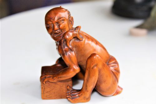 A Superb and Finely Carved Boxwood Okimono of the Rat Catcher Japanese Circa 1880