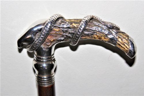 A Superb Bamboo Walking Stick the Top Depicting a Finely Cast Silver Snake Coiled Around a Stag Horn  Circa 1880