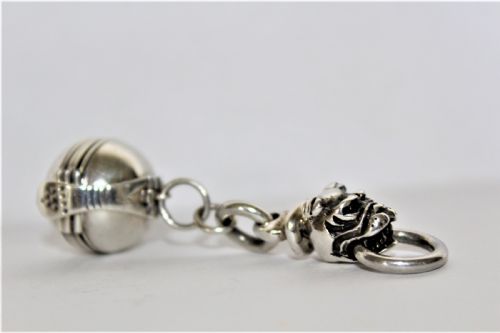 An Interesting and Unusual Silver Fob Depicting a Dogs Head and Ball