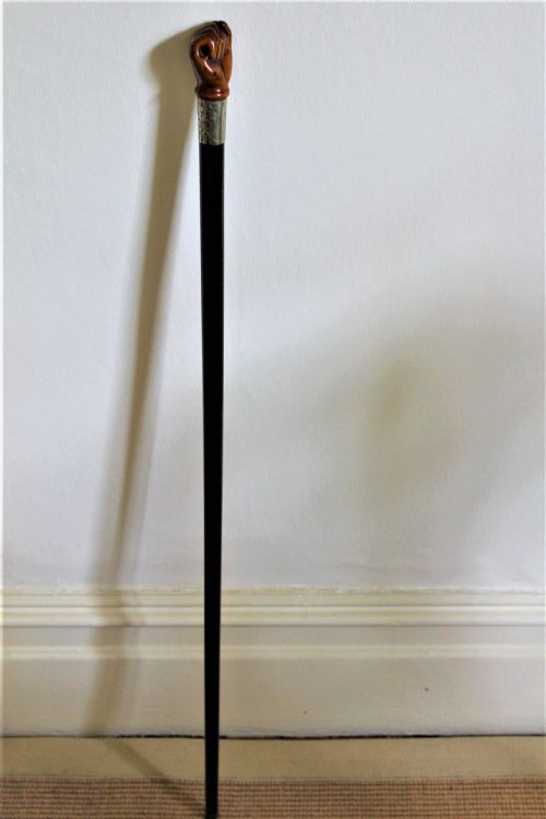 A VERY STYLISH WALKING STICK THE TOP CARVED IN FRUITWOOD AND MODELLED AS A CLENCHED FIST - ADDITIONAL PHOTO 4