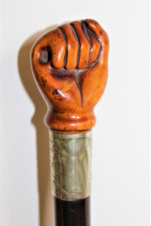 A VERY STYLISH WALKING STICK THE TOP CARVED IN FRUITWOOD AND MODELLED AS A CLENCHED FIST - ADDITIONAL PHOTO 6