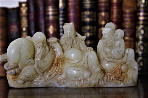 A Finely Carved Chinese Hardstone Possibly Jade Figural Brush Rest