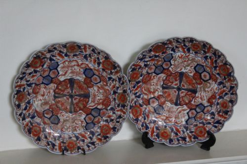 A Pair of Very Finely Painted and Gilded Imari Plates