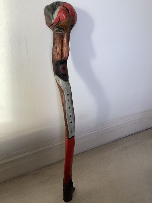 AN EXTRAORDINARY SUBSTANTIAL POLYCHROMED THORN WOOD FOLK ART WALKING STICK