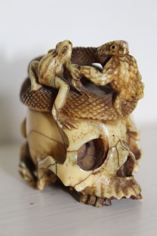 An Extremely Well Carved Stag Horn Memento Mori Skull