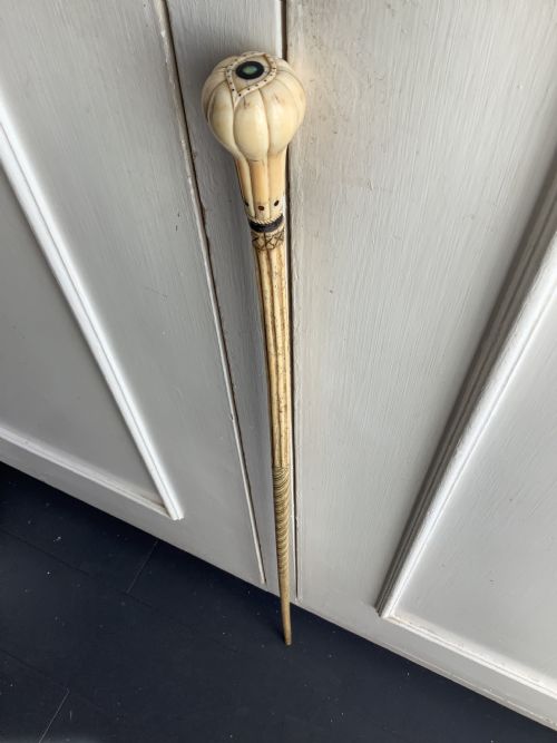 An Interesting and Well Carved Whale Bone Walking Stick with a Whale Tooth Carved Handle