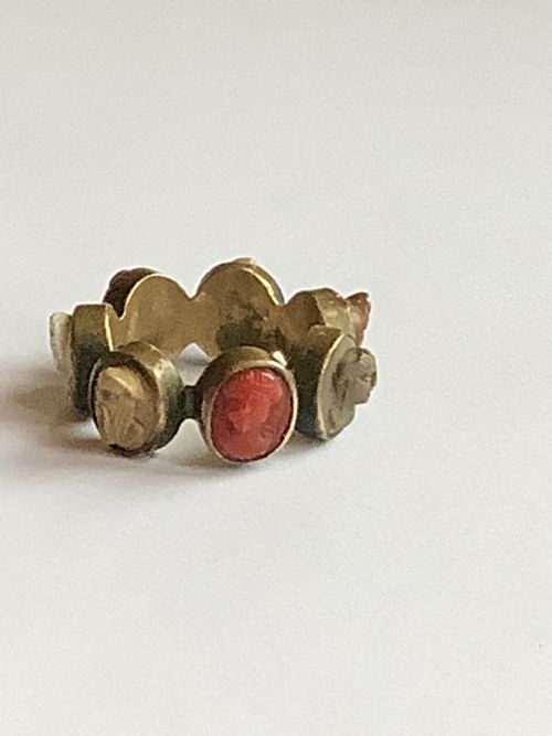 A Rare and Unusual Grand Tour Cameo Ring with Seven Cameos. Ring Size M