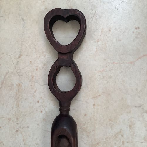 A LONG AND WELL CARVED WOOD WELSH LOVE SPOON - ADDITIONAL PHOTO 1