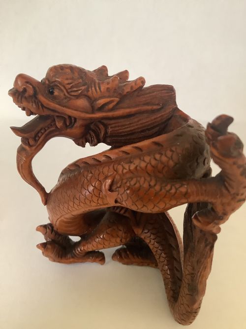 An Exceedingly Finely Carved and Signed Japanese Boxwood Dragon