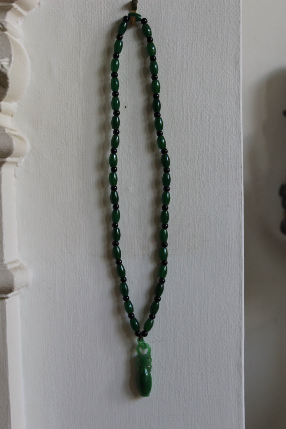 A Spinach Green Jade Necklace and Pendant  View IV