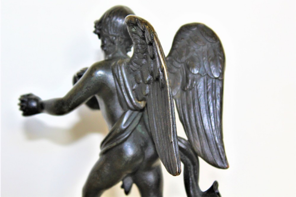 Finely cast Italian Grand Tour bronze of a winged angel riding on a cloud Circa 1830 to 1870 View III