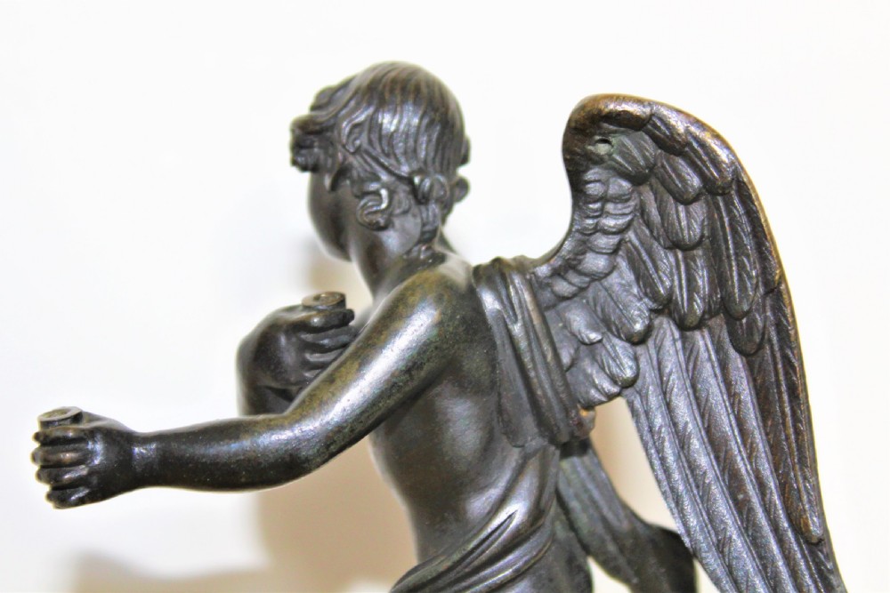 Finely cast Italian Grand Tour bronze of a winged angel riding on a cloud Circa 1830 to 1870 View IV