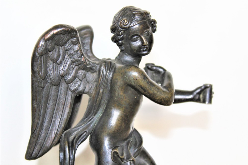 Finely cast Italian Grand Tour bronze of a winged angel riding on a cloud Circa 1830 to 1870 View V