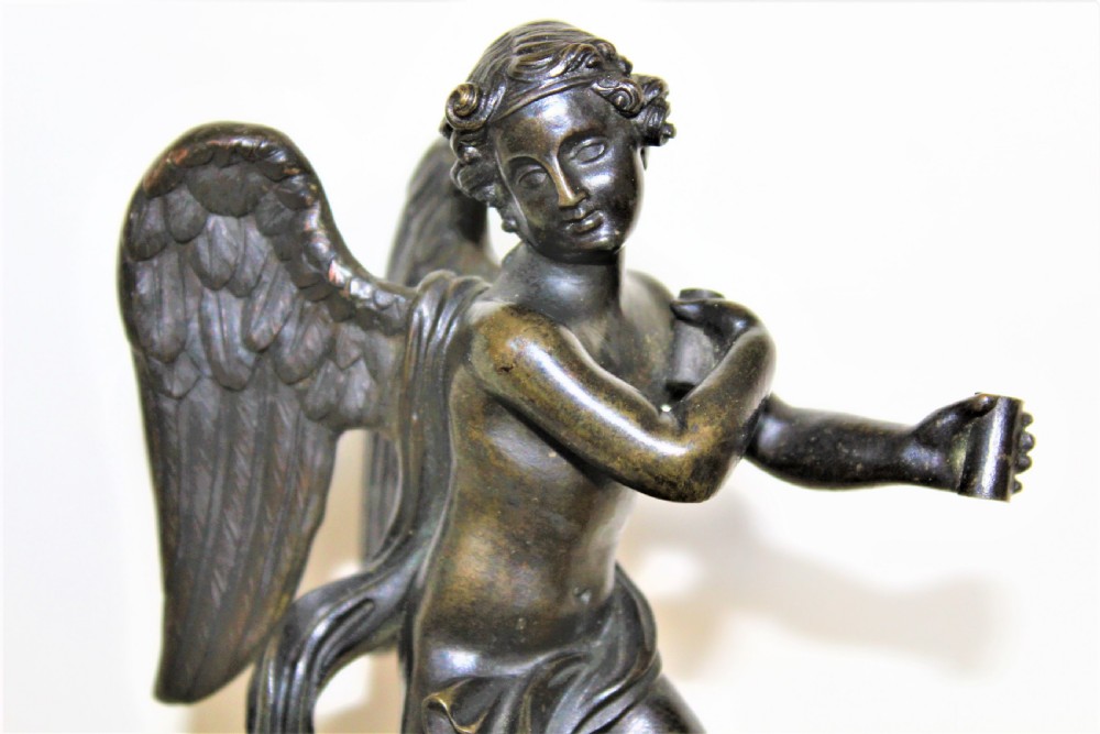 Finely cast Italian Grand Tour bronze of a winged angel riding on a cloud Circa 1830 to 1870 View VI