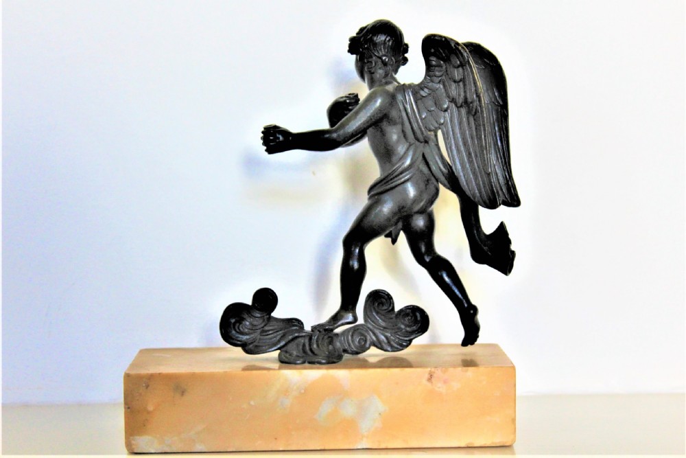 Finely cast Italian Grand Tour bronze of a winged angel riding on a cloud Circa 1830 to 1870 View VII