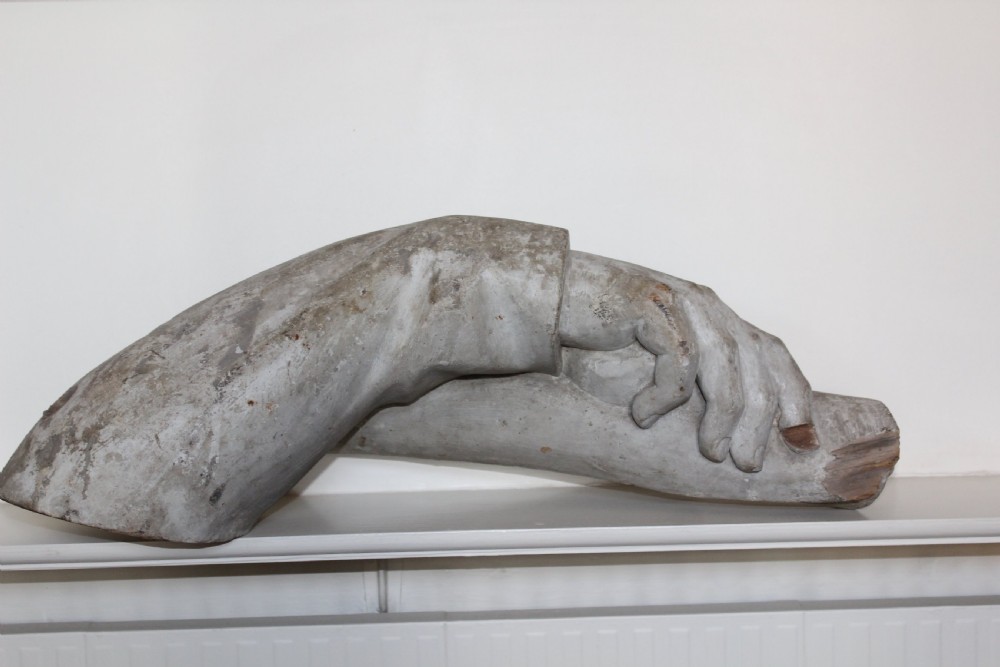 Well carved wood hand and arm holding a scroll English Circa 1880