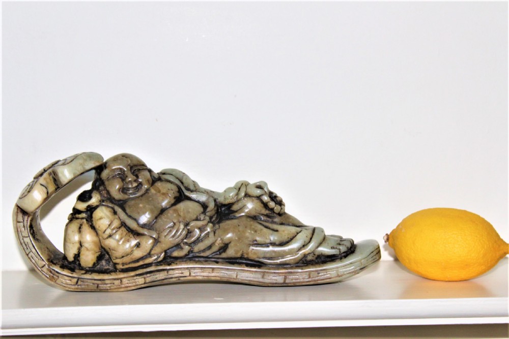 Well carved large Chinese soapstone seal depicting a Buddha reclining on a ruyi sceptre with calligraphy Circa 1880 View III