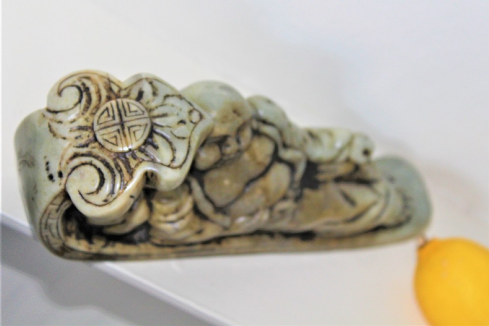 Well carved large Chinese soapstone seal depicting a Buddha reclining on a ruyi sceptre with calligraphy Circa 1880 View IV