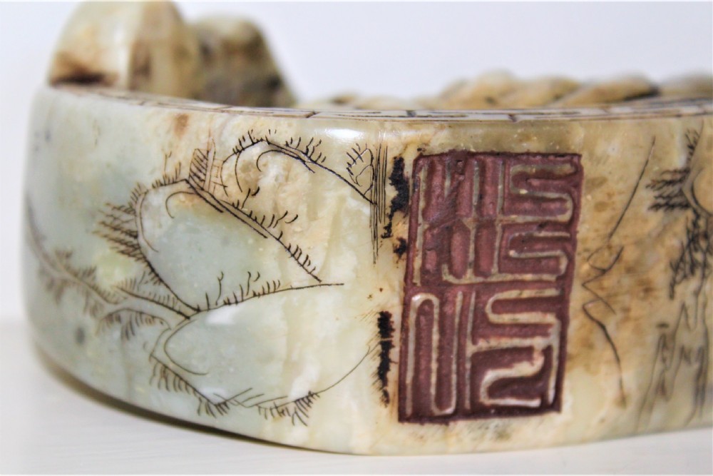Well carved large Chinese soapstone seal depicting a Buddha reclining on a ruyi sceptre with calligraphy Circa 1880 View VII