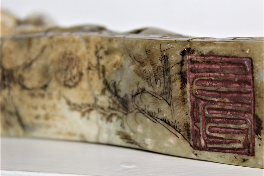 Well carved large Chinese soapstone seal depicting a Buddha reclining on a ruyi sceptre with calligraphy Circa 1880 View VIII