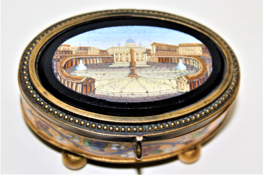 A fine 19th century Italian Grand Tour Micro Mosaic gilt metal box the oval depicting St Marks Square