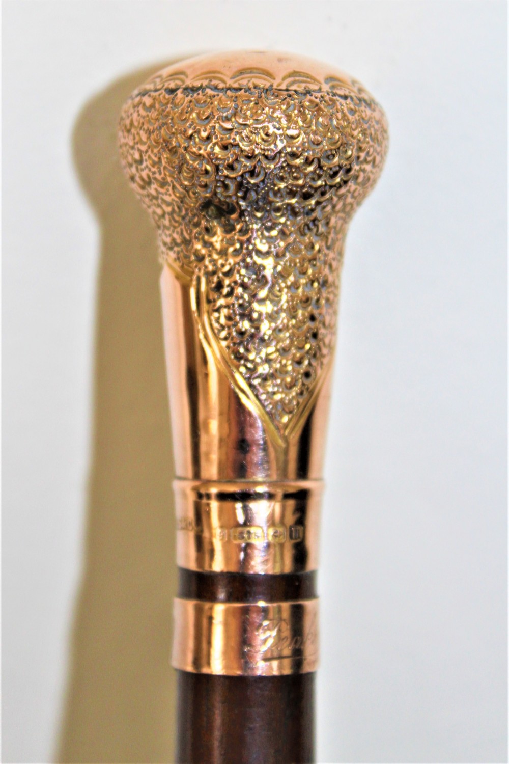A very fine gold topped lady,s walking stick. The shaft is made of mahogany Circa 1919 