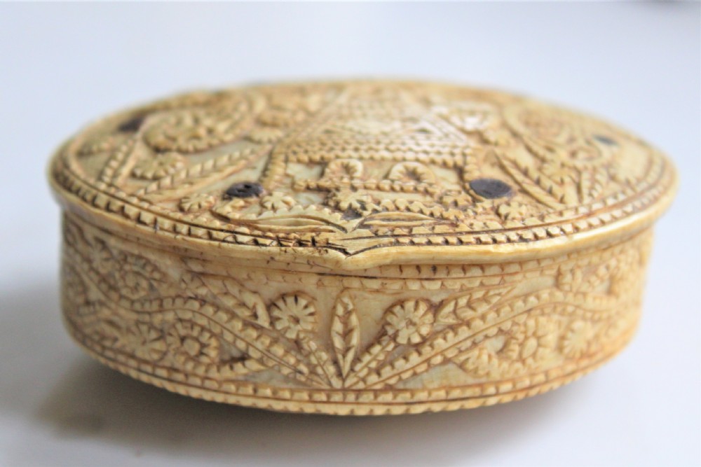 A rare 15th century carved bone hinged box dated 1488 of oval form with overall carved decoration  View III