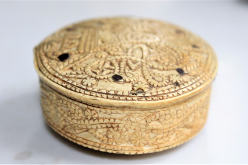 A rare 15th century carved bone hinged box dated 1488 of oval form with overall carved decoration  View IV