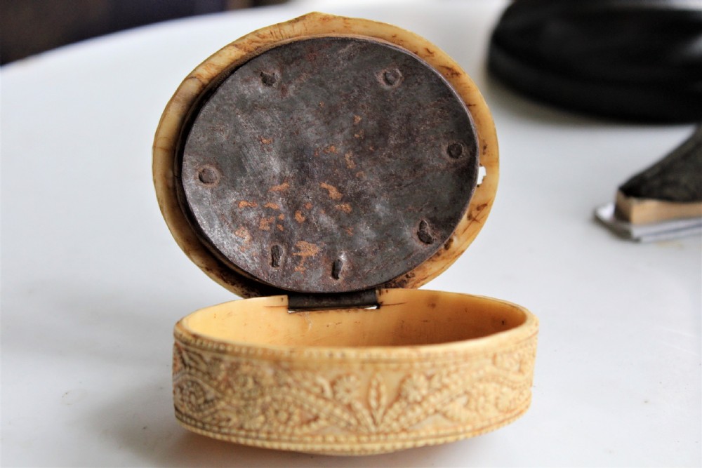 A rare 15th century carved bone hinged box dated 1488 of oval form with overall carved decoration  View VI
