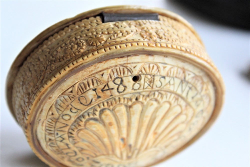 A rare 15th century carved bone hinged box dated 1488 of oval form with overall carved decoration  View VII