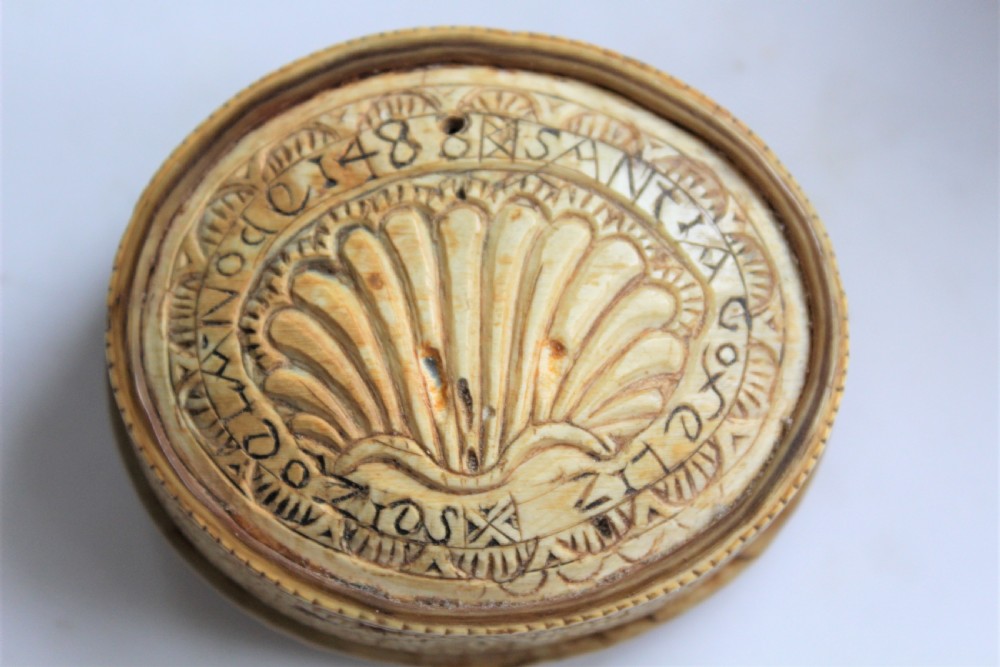 A rare 15th century carved bone hinged box dated 1488 of oval form with overall carved decoration  View VIII