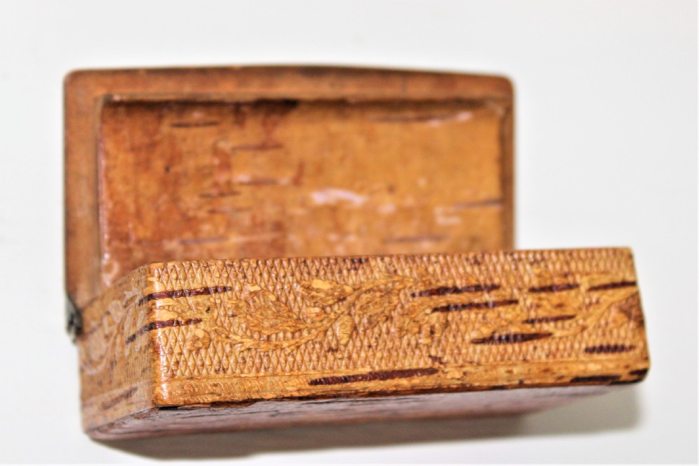 A 19th century Swedish relief carved birch wood snuffbox depicting a hunting scene  View IV