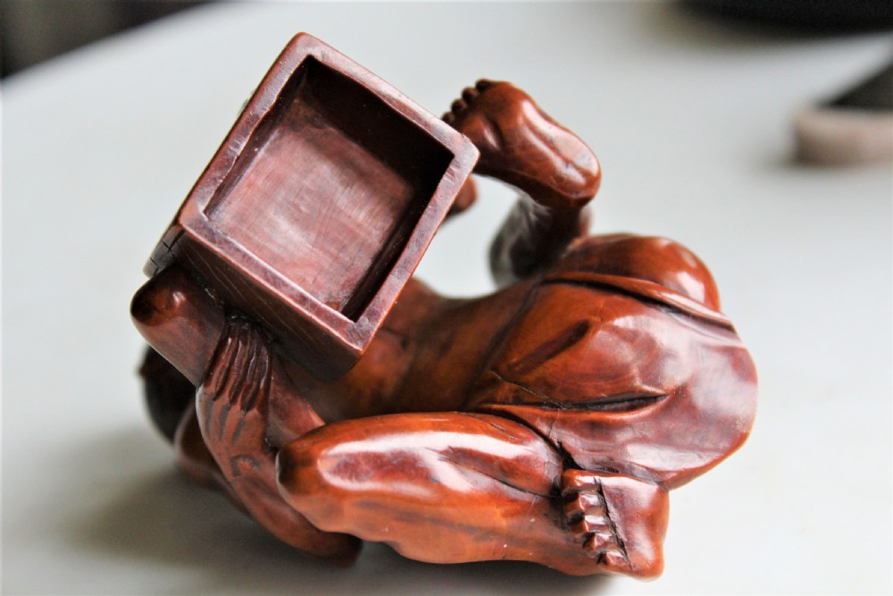A superb and finely carved boxwood Okimono of the rat catcher Japanese Circa 1880  View V