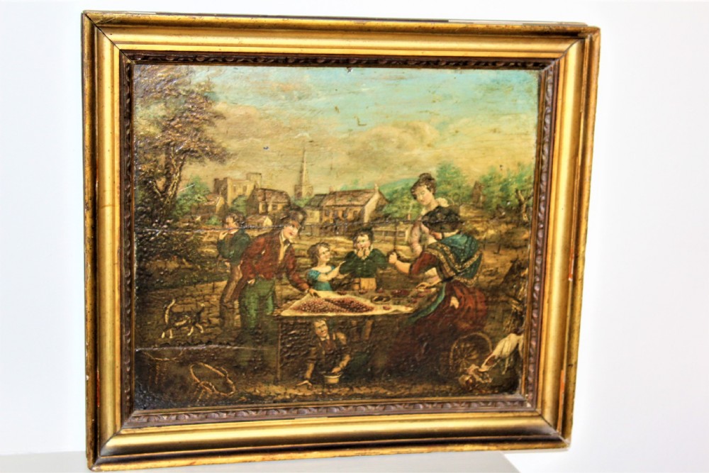 An antique oil painting on a wood panel depicting figures, children, and dogs in a rural village setting, enclosed in a gilded frame. View II