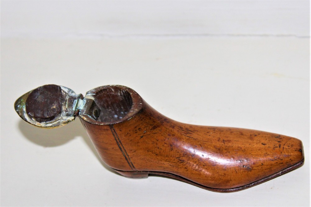 A very fine and tactile Georgian fruitwood snuff box in the shape of a shoe with a brass hinged lid and a brass horse shoe  View IV