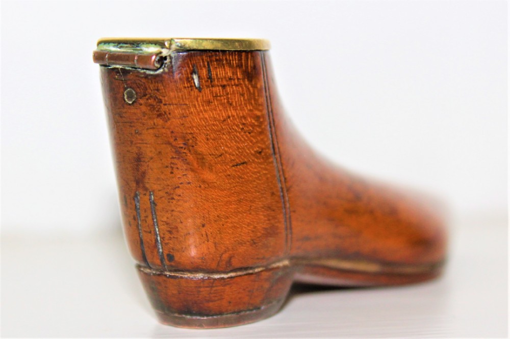 A very fine and tactile Georgian fruitwood snuff box in the shape of a shoe with a brass hinged lid and a brass horse shoe  View VII