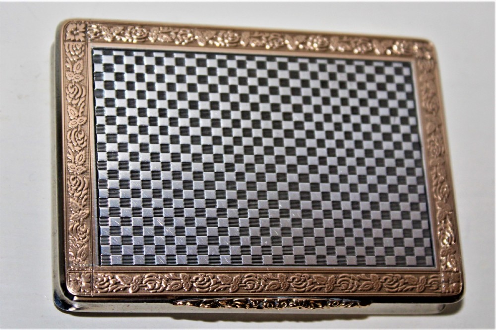 A superb and extremely smart silver and gold snuff box of heavy gauge silver which has a very attractive chequered finish Austrian Circa 1900