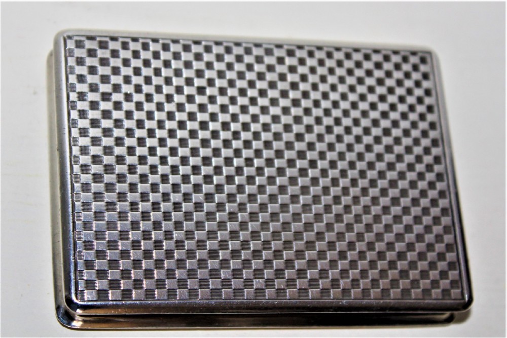 A superb and extremely smart silver and gold snuff box of heavy gauge silver which has a very attractive chequered finish Austrian Circa 1900 View II