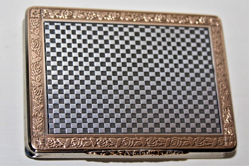 A superb and extremely smart silver and gold snuff box of heavy gauge silver which has a very attractive chequered finish Austrian Circa 1900 View VIII