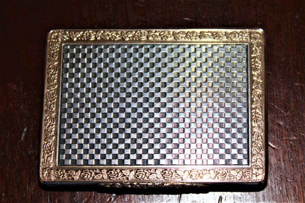A superb and extremely smart silver and gold snuff box of heavy gauge silver which has a very attractive chequered finish Austrian Circa 1900 View IX