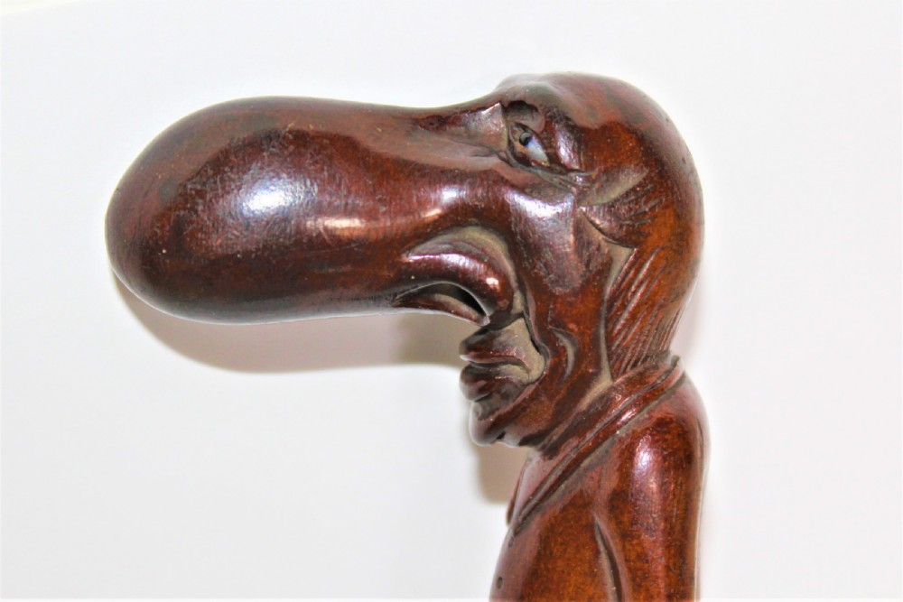An interesting and amusing hard wood carving of Ally Sloper with glass eyes View V