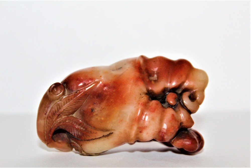 A superb  and tactile carved Chinese soapstone fruiting pod with a Bat feeding possibly a netsuke  View IV