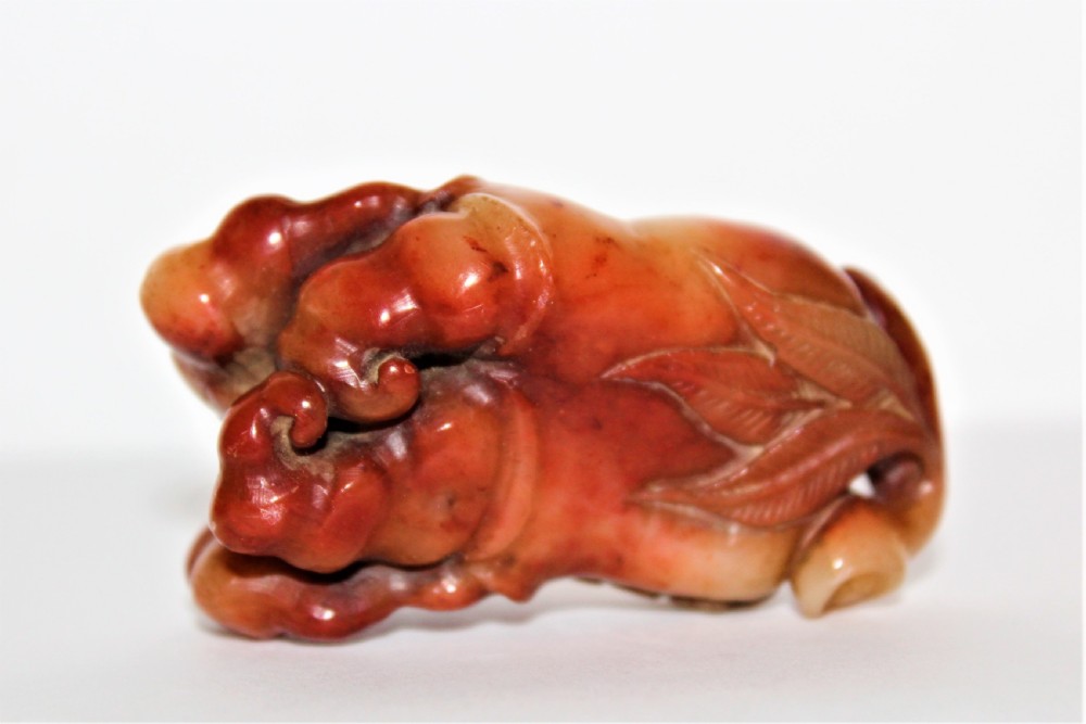 A superb  and tactile carved Chinese soapstone fruiting pod with a Bat feeding possibly a netsuke  View V