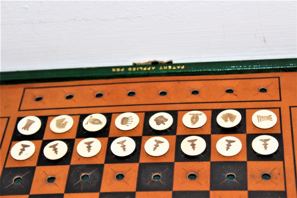An unusual and good quality Edwardian leather travelling chess set by J C Vickery of Regent Street  View V