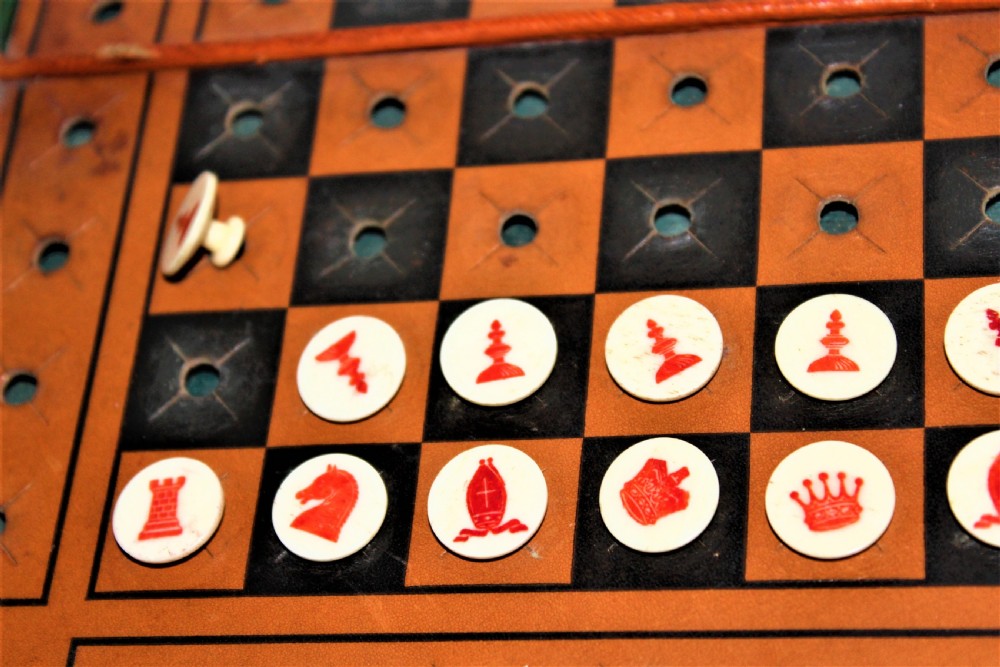An unusual and good quality Edwardian leather travelling chess set by J C Vickery of Regent Street  View VI