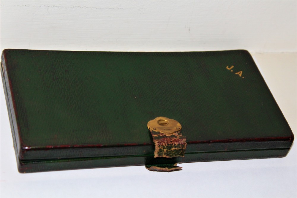 An unusual and good quality Edwardian leather travelling chess set by J C Vickery of Regent Street  View VIII