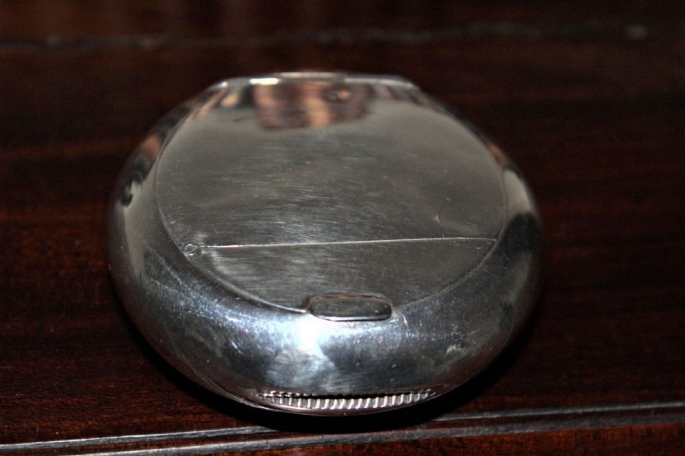 A rare silver circular tobacco box with a concealed vesta case in the lid  View VIII